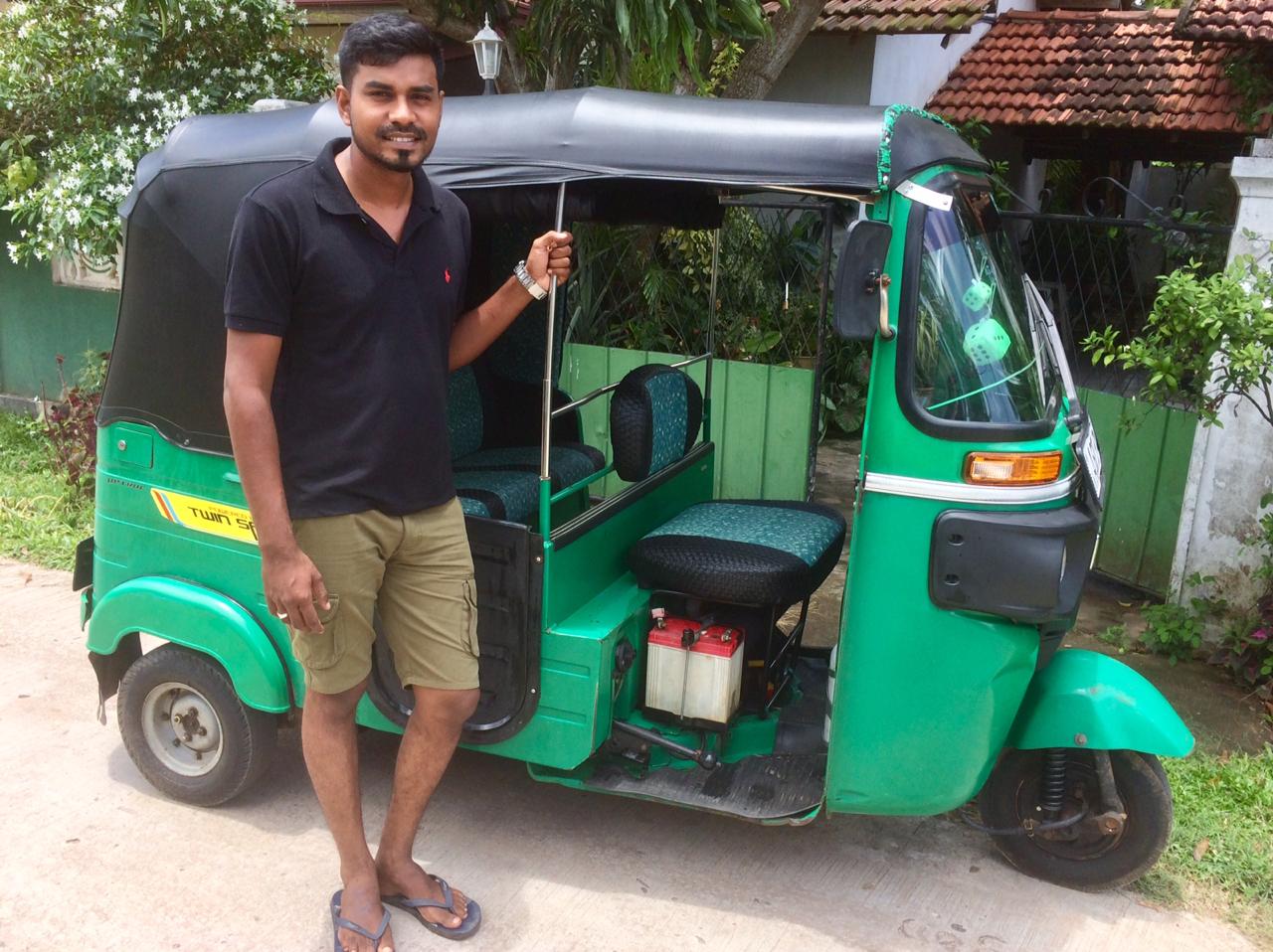 Nick our Holiday Houseboy in Negombo with his Tuktuk